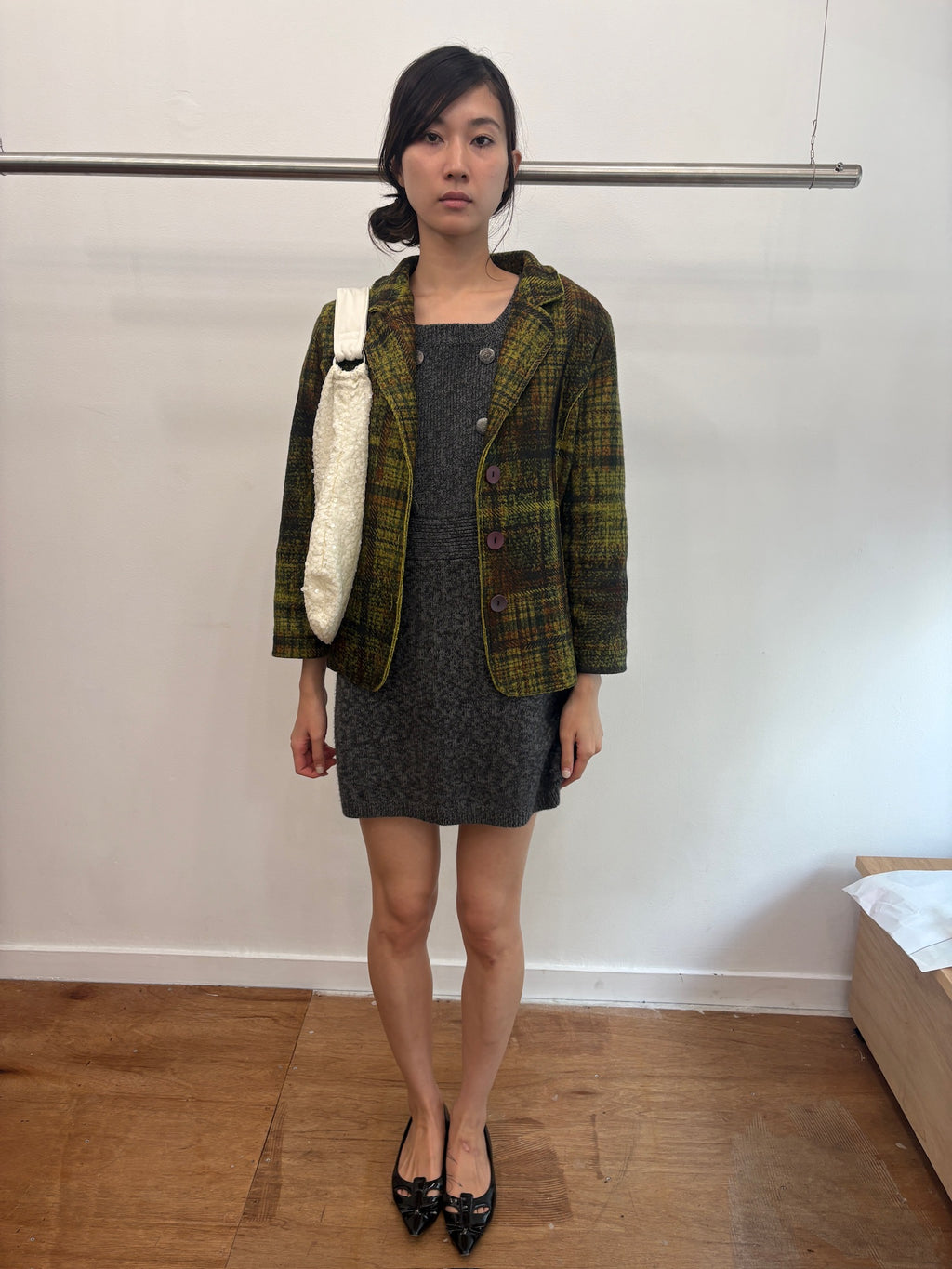 green knit coat