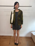green knit coat