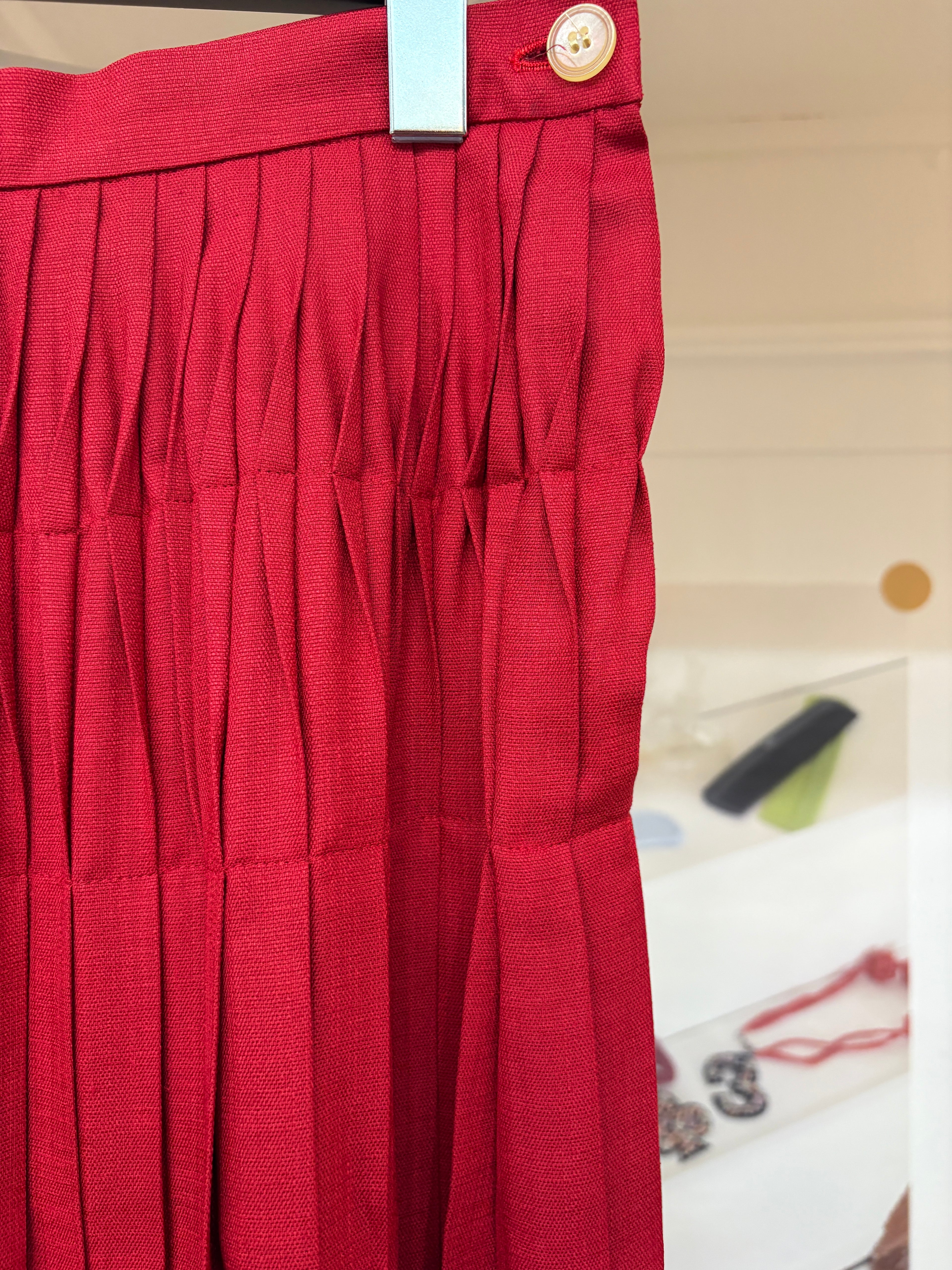 red pleats midi skirt
