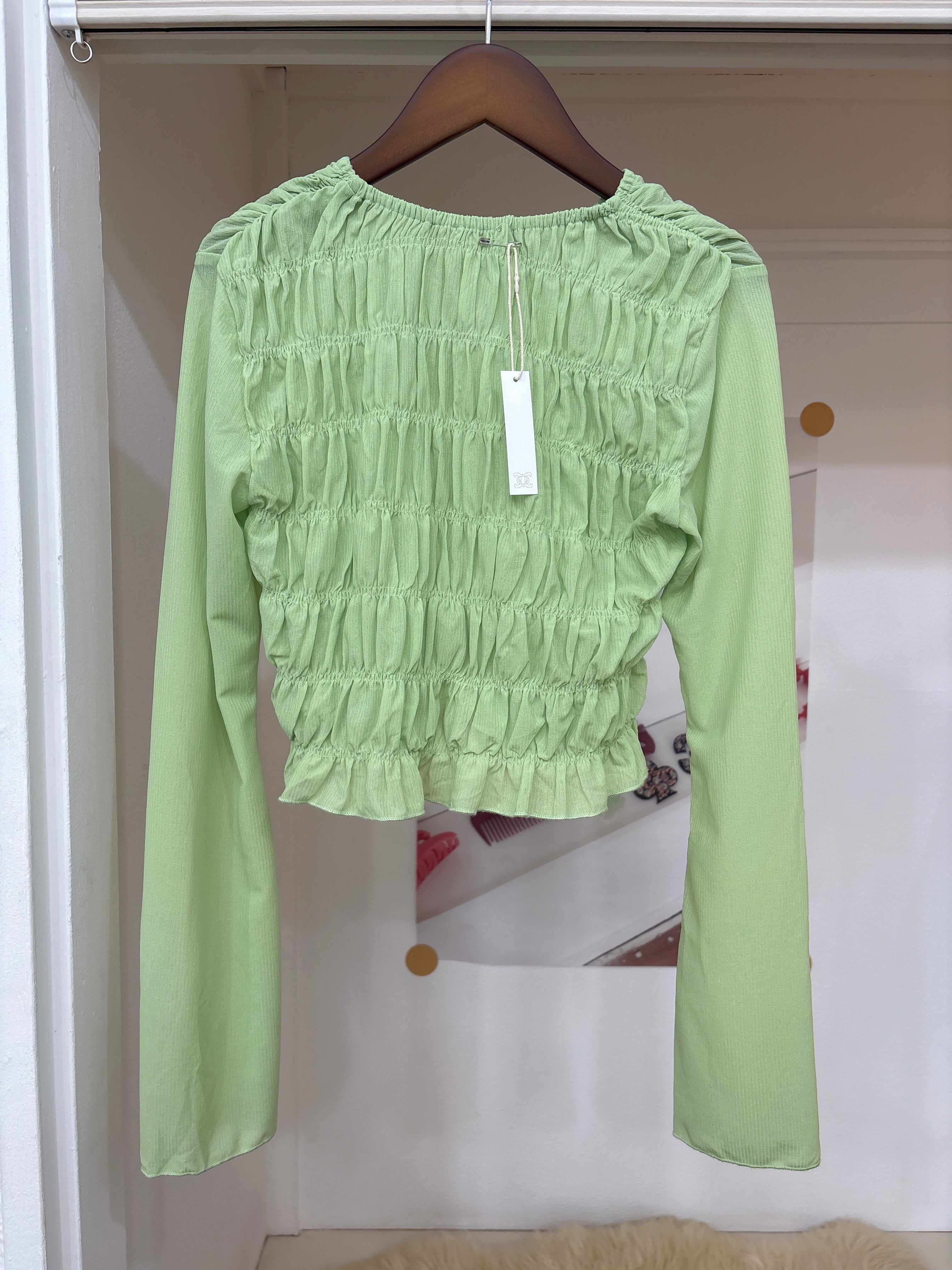 mint ruffle tunic