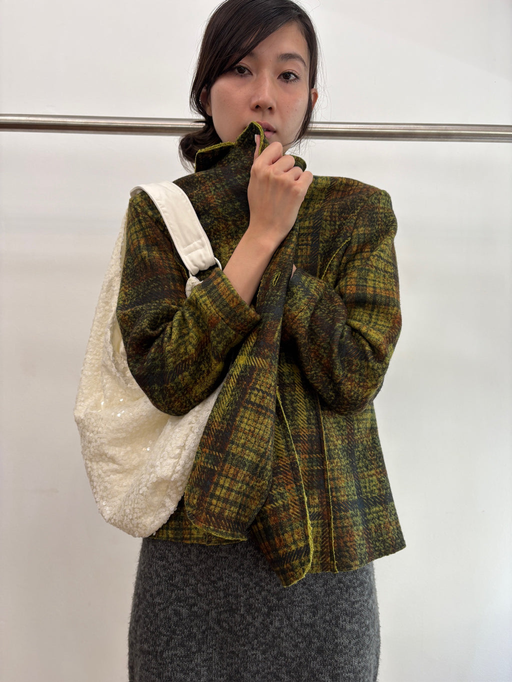 green knit coat