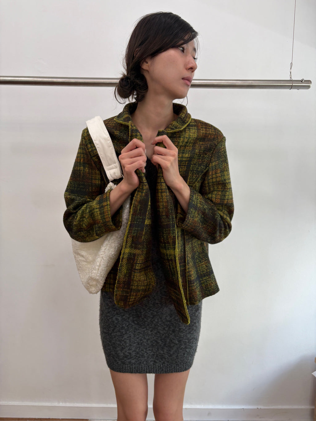 green knit coat