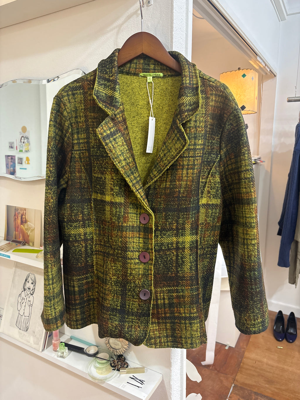 green knit coat