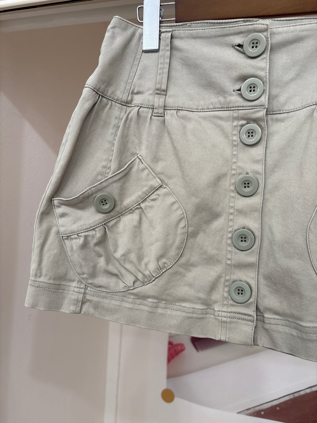 beige button skirt