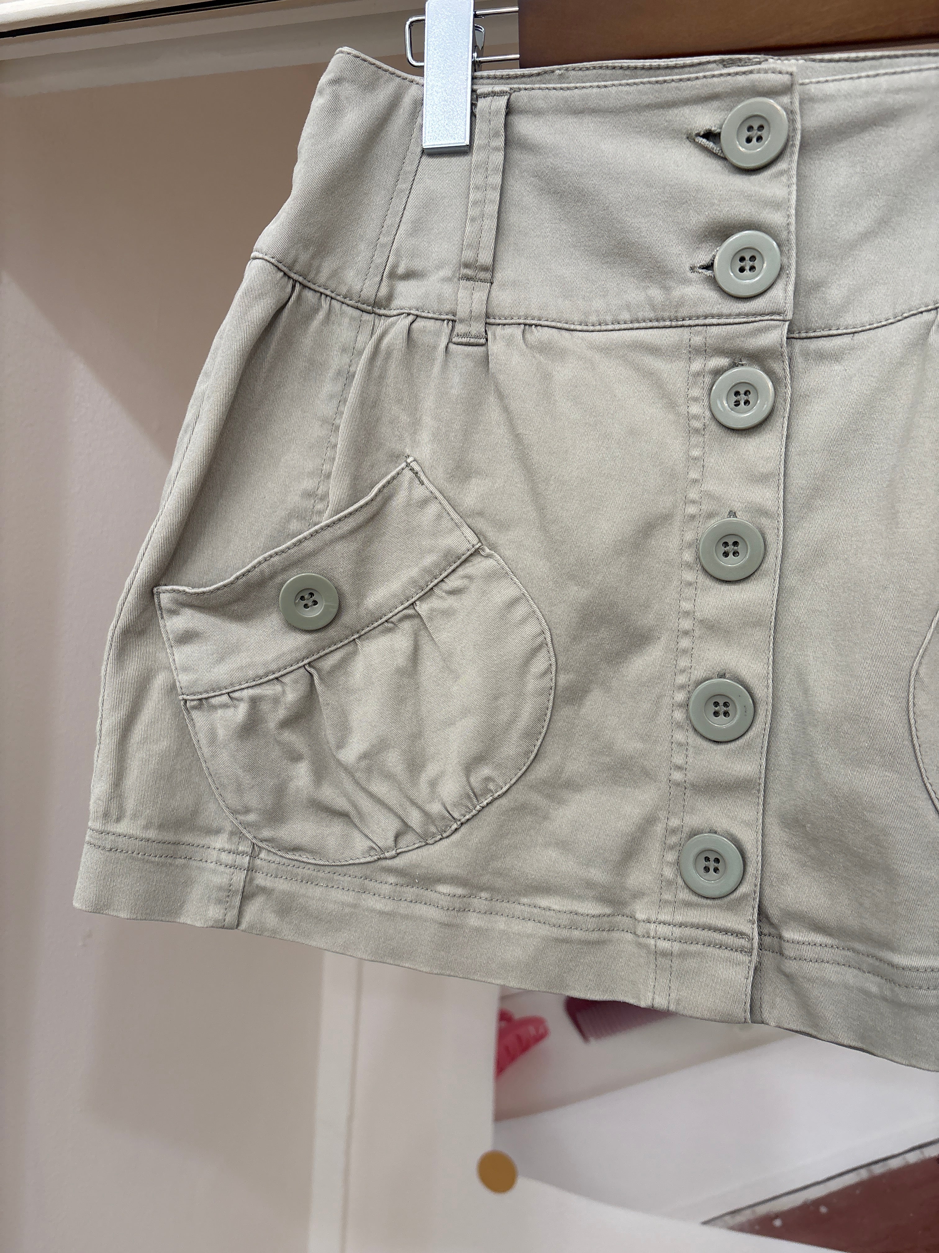 beige button skirt