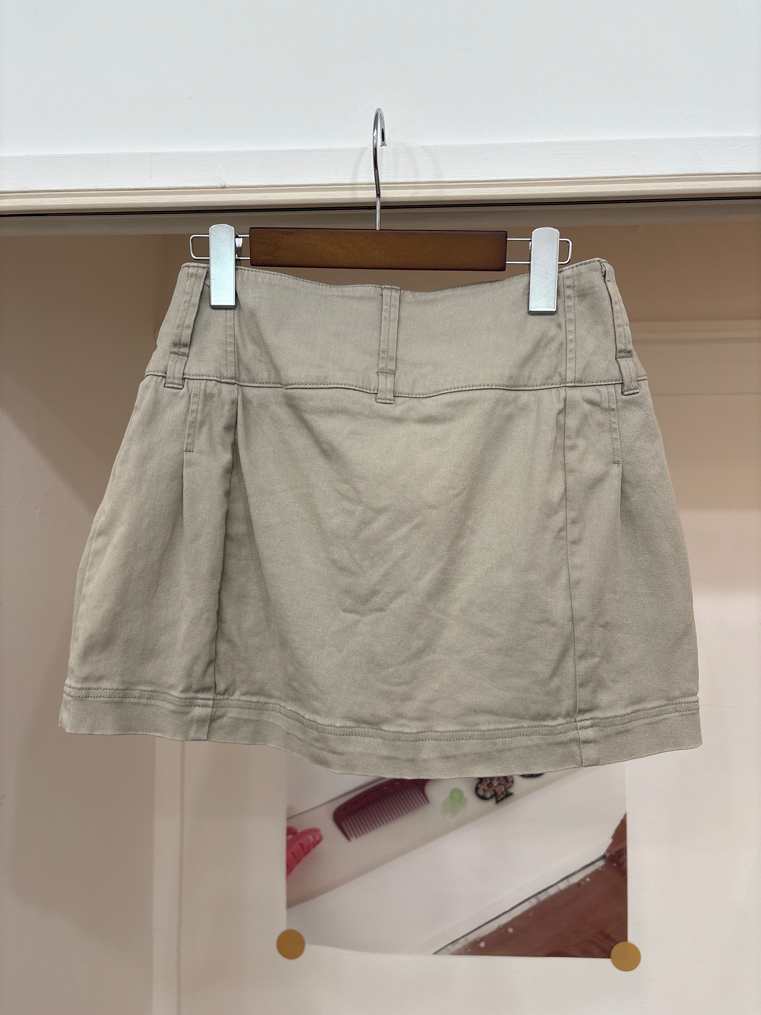 beige button skirt