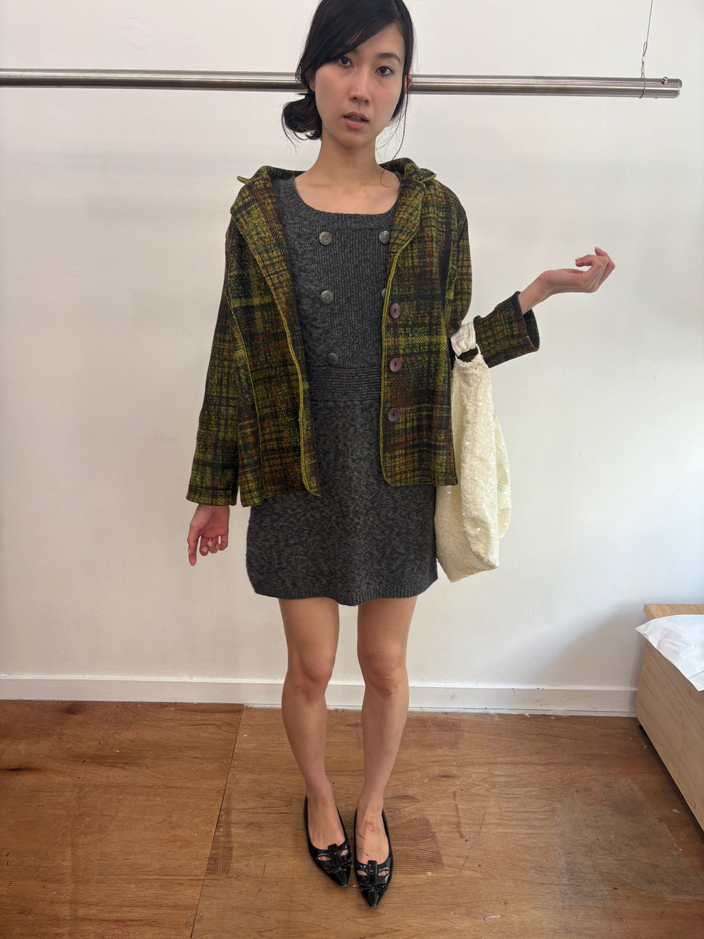 green knit coat