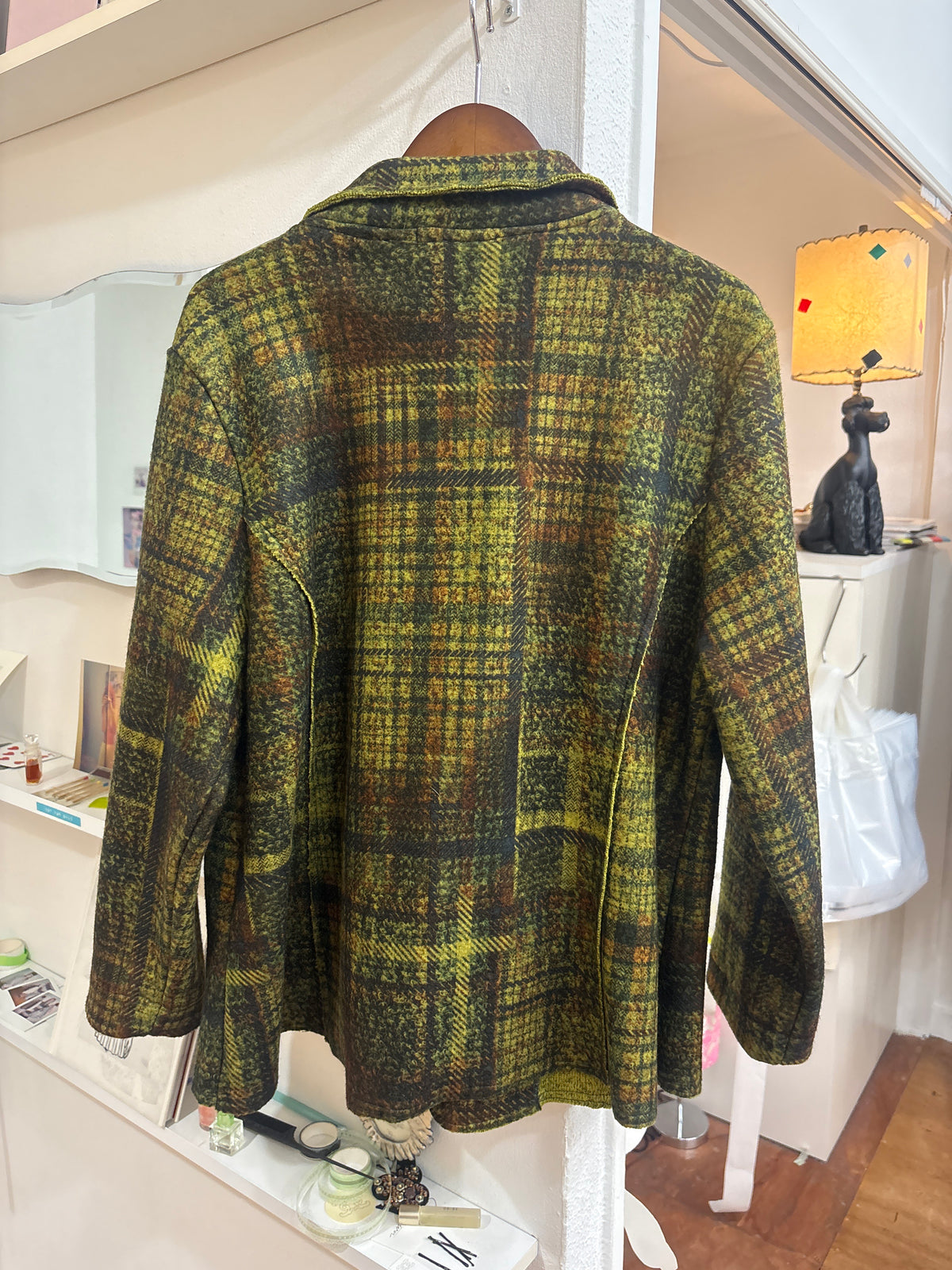 green knit coat