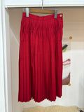 red pleats midi skirt