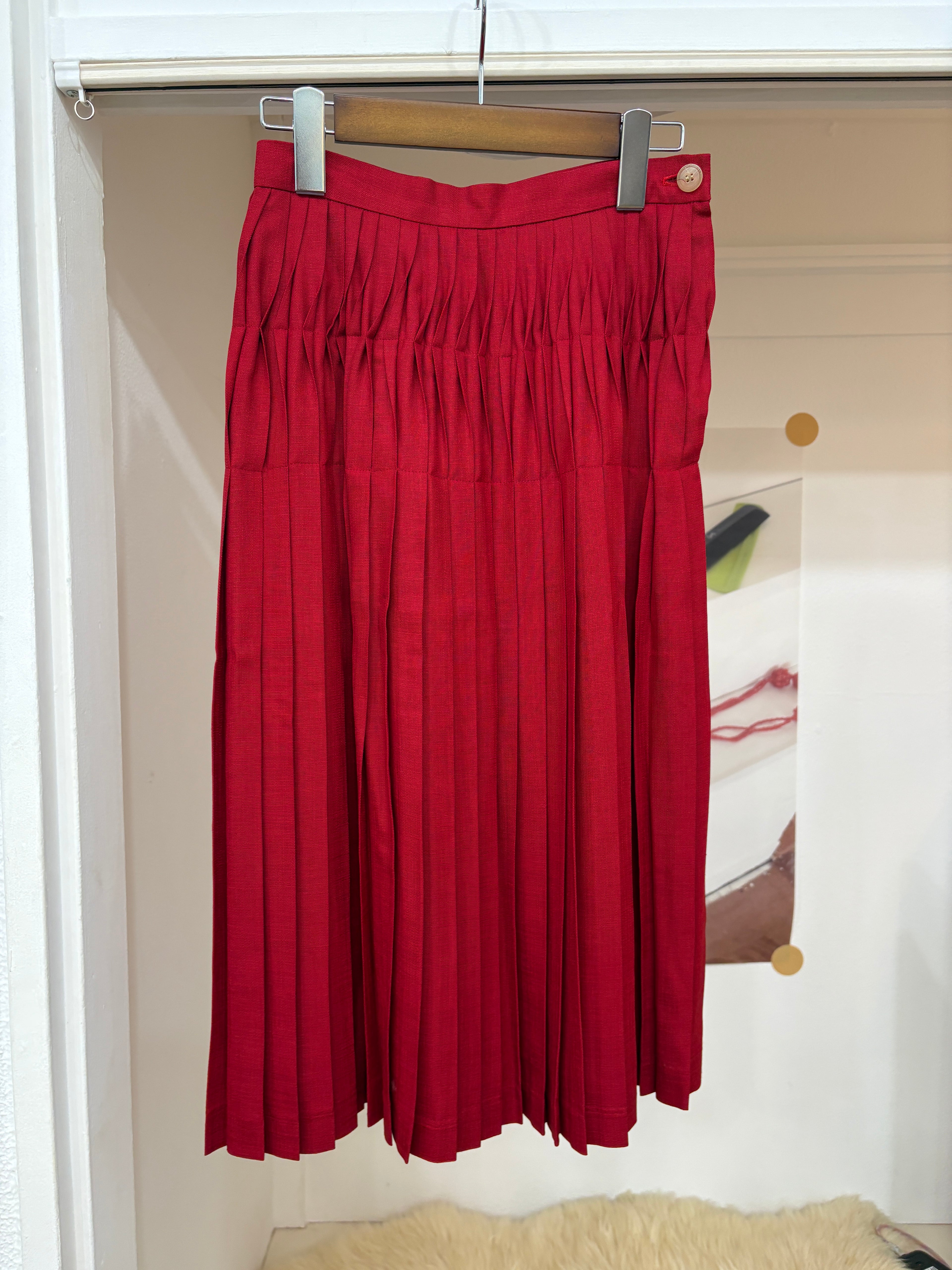 red pleats midi skirt