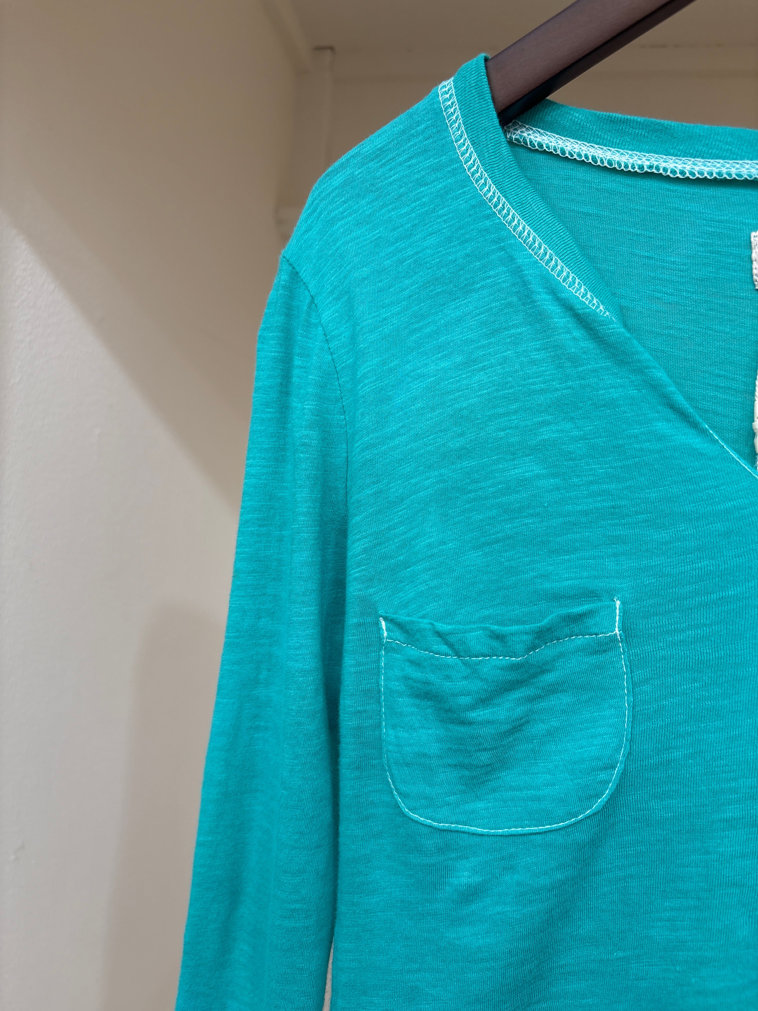 turquoise top